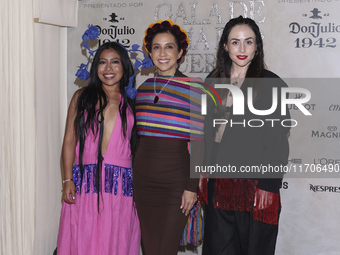 Yalitza Aparicio, Karla Martinez de Salas, and Zuria Vega attend the red carpet for the Vogue Dia de Muertos Gala at Palacio de Mineria in M...