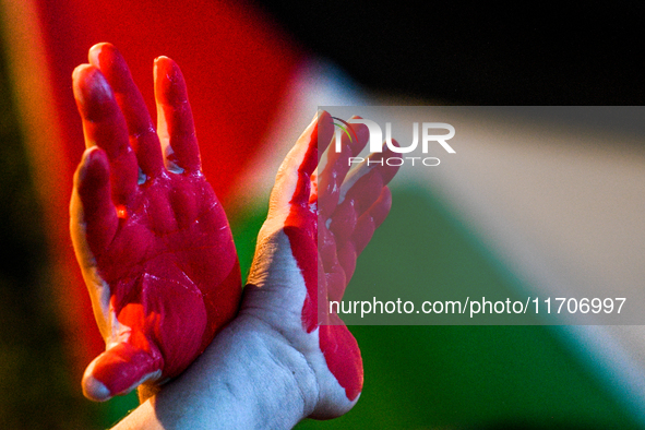 Citizens and activists gather to participate in a rally to support Palestinians in front of the US embassy in Rome, Italy, on October 25, 20...