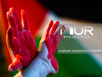 Citizens and activists gather to participate in a rally to support Palestinians in front of the US embassy in Rome, Italy, on October 25, 20...