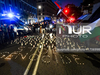 Citizens and activists gather to participate in a rally to support Palestinians in front of the US embassy in Rome, Italy, on October 25, 20...