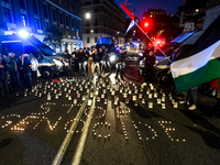 Citizens and activists gather to participate in a rally to support Palestinians in front of the US embassy in Rome, Italy, on October 25, 20...