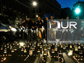 Citizens and activists gather to participate in a rally to support Palestinians in front of the US embassy in Rome, Italy, on October 25, 20...