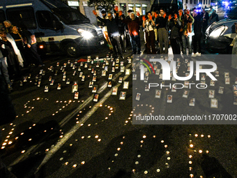 Citizens and activists gather to participate in a rally to support Palestinians in front of the US embassy in Rome, Italy, on October 25, 20...