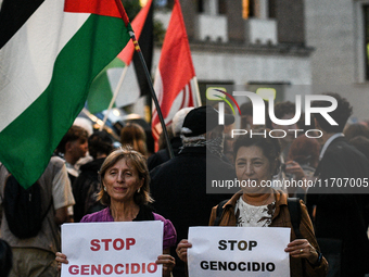 Citizens and activists gather to participate in a rally to support Palestinians in front of the US embassy in Rome, Italy, on October 25, 20...