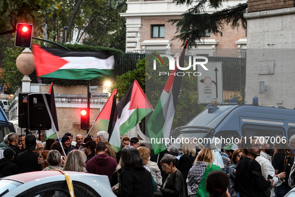 Citizens and activists gather to participate in a rally to support Palestinians in front of the US embassy in Rome, Italy, on October 25, 20...