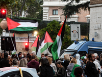 Citizens and activists gather to participate in a rally to support Palestinians in front of the US embassy in Rome, Italy, on October 25, 20...