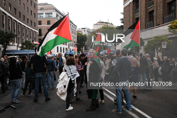 Citizens and activists gather to participate in a rally to support Palestinians in front of the US embassy in Rome, Italy, on October 25, 20...