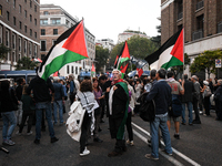 Citizens and activists gather to participate in a rally to support Palestinians in front of the US embassy in Rome, Italy, on October 25, 20...