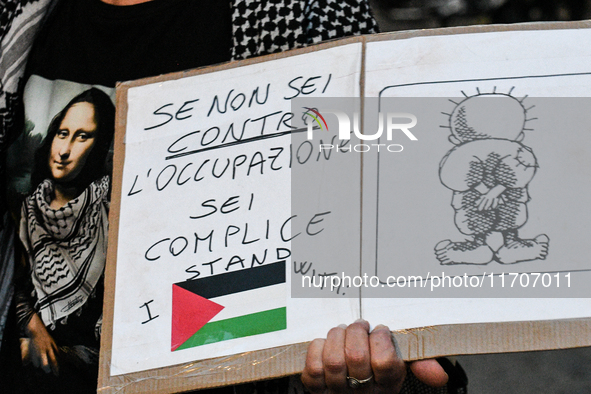 Citizens and activists gather to participate in a rally to support Palestinians in front of the US embassy in Rome, Italy, on October 25, 20...