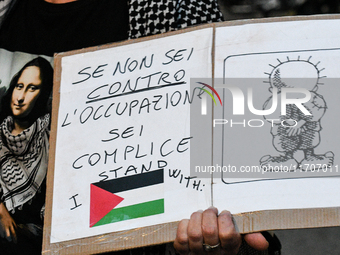 Citizens and activists gather to participate in a rally to support Palestinians in front of the US embassy in Rome, Italy, on October 25, 20...