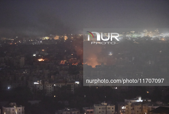 Smoke rises from the site of an Israeli airstrike that targets a neighborhood in Beirut's southern suburbs on October 25, 2024. Israel expan...