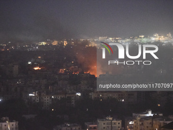 Smoke rises from the site of an Israeli airstrike that targets a neighborhood in Beirut's southern suburbs on October 25, 2024. Israel expan...