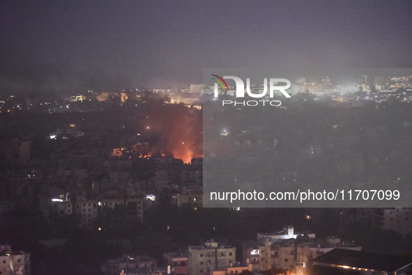 Smoke rises from the site of an Israeli airstrike that targets a neighborhood in Beirut's southern suburbs on October 25, 2024. Israel expan...