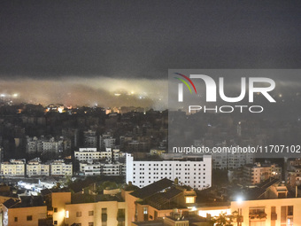 Smoke rises from the site of an Israeli airstrike that targets a neighborhood in Beirut's southern suburbs on October 25, 2024. Israel expan...