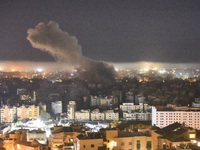 Smoke rises from the site of an Israeli airstrike that targets a neighborhood in Beirut's southern suburbs on October 25, 2024. Israel expan...