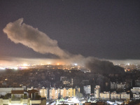 Smoke rises from the site of an Israeli airstrike that targets a neighborhood in Beirut's southern suburbs on October 25, 2024. Israel expan...