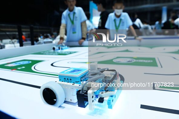 Participants prepare before the Qingdao International RoboCup 2024 in Qingdao, China, on October 26, 2024. 