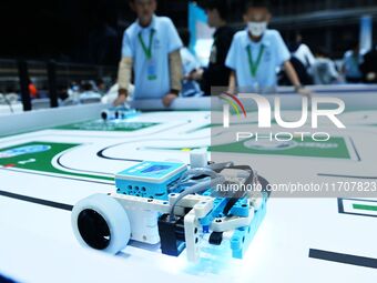 Participants prepare before the Qingdao International RoboCup 2024 in Qingdao, China, on October 26, 2024. (