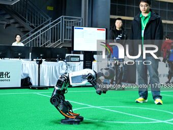 A robot stands up during a performance at the 2024 Asia Pacific Robot World Cup Qingdao International Invitational in Qingdao, Shandong, Chi...