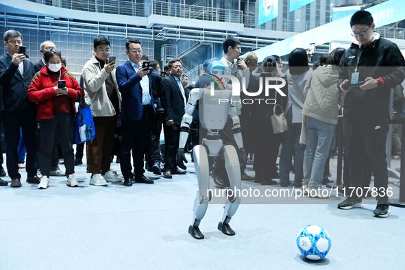 A robot plays soccer at the 2024 Asia Pacific Robot World Cup Qingdao International Invitational in Qingdao, China, on October 26, 2024. 