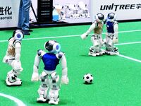 Robots play soccer at the 2024 Asia Pacific Robot World Cup Qingdao International Invitational in a football match in Qingdao, China, on Oct...