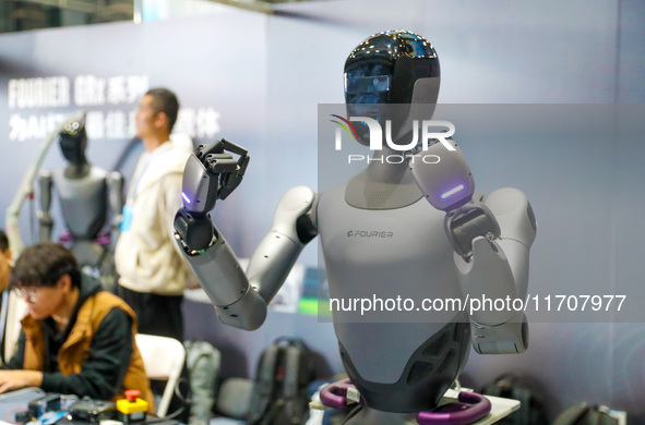 A robot demonstrates the dexterity of its fingers during the Qingdao International Invitational Tournament of the 2024 Asia-Pacific RoboCup...