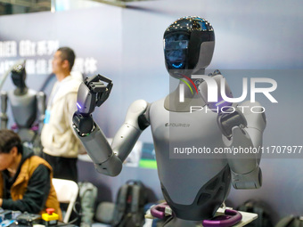 A robot demonstrates the dexterity of its fingers during the Qingdao International Invitational Tournament of the 2024 Asia-Pacific RoboCup...