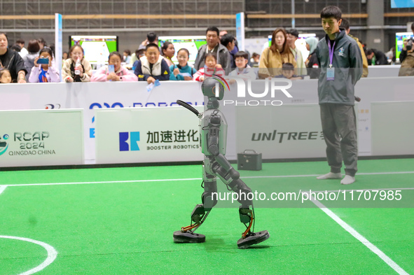 A robot performs a gait demonstration during the Qingdao International Robotics World Cup 2024 in Qingdao, China, on October 26, 2024. 