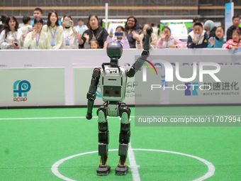 A robot waves to the audience during the Qingdao International Invitational Tournament of the 2024 Asia-Pacific RoboCup in Qingdao, China, o...