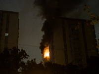 A Russian drone hits a residential high-rise in Kyiv, Ukraine, on October 25, 2024. A 14-year-old girl is killed, and at least 6 people are...