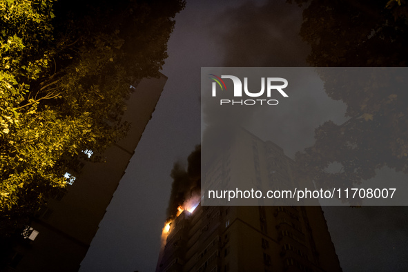 A Russian drone hits a residential high-rise in Kyiv, Ukraine, on October 25, 2024. A 14-year-old girl is killed, and at least 6 people are...