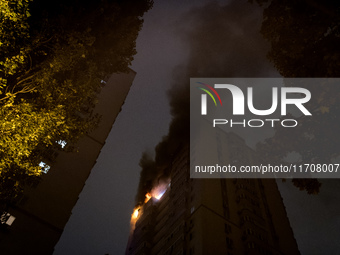 A Russian drone hits a residential high-rise in Kyiv, Ukraine, on October 25, 2024. A 14-year-old girl is killed, and at least 6 people are...