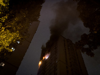 A Russian drone hits a residential high-rise in Kyiv, Ukraine, on October 25, 2024. A 14-year-old girl is killed, and at least 6 people are...