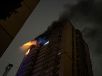 A Russian drone hits a residential high-rise in Kyiv, Ukraine, on October 25, 2024. A 14-year-old girl is killed, and at least 6 people are...