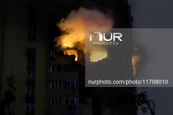 A Russian drone hits a residential high-rise in Kyiv, Ukraine, on October 25, 2024. A 14-year-old girl is killed, and at least 6 people are...