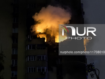 A Russian drone hits a residential high-rise in Kyiv, Ukraine, on October 25, 2024. A 14-year-old girl is killed, and at least 6 people are...