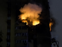 A Russian drone hits a residential high-rise in Kyiv, Ukraine, on October 25, 2024. A 14-year-old girl is killed, and at least 6 people are...