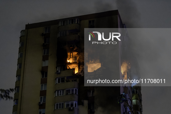 A Russian drone hits a residential high-rise in Kyiv, Ukraine, on October 25, 2024. A 14-year-old girl is killed, and at least 6 people are...