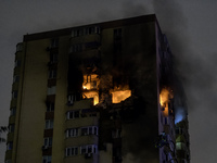 A Russian drone hits a residential high-rise in Kyiv, Ukraine, on October 25, 2024. A 14-year-old girl is killed, and at least 6 people are...