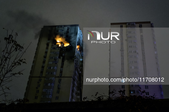 A Russian drone hits a residential high-rise in Kyiv, Ukraine, on October 25, 2024. A 14-year-old girl is killed, and at least 6 people are...