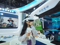 Visitors experience the ''VR Aviation Training System'' at the 2nd CATA Aviation Conference in Beijing, China, on October 26, 2024. (