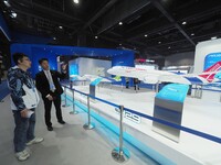 The audience visits the ''C929 Aircraft Model'' at the 2nd CATA Aviation Conference in Beijing, China, on October 26, 2024. (