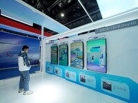 The audience visits the ''Passenger Biometric Service Platform'' at the 2nd CATA Aviation Conference in Beijing, China, on October 26, 2024....