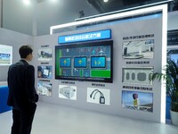 The audience visits the ''Smart Airport System'' at the 2nd CATA Aviation Conference in Beijing, China, on October 26, 2024. (