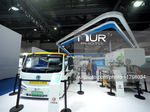 The audience visits the ''New Energy Pipeline Refueling Vehicle'' at the 2nd CATA Aviation Conference in Beijing, China, on October 26, 2024...