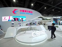 The audience visits the ''C919 Aircraft Model'' at the China Eastern Airlines booth at the 2nd CATA Aviation Conference in Beijing, China, o...