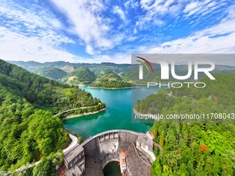 An aerial photo shows the scenery of Mingyue Lake in Chongqing, China, on October 25, 2024. (