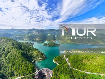 An aerial photo shows the scenery of Mingyue Lake in Chongqing, China, on October 25, 2024. (