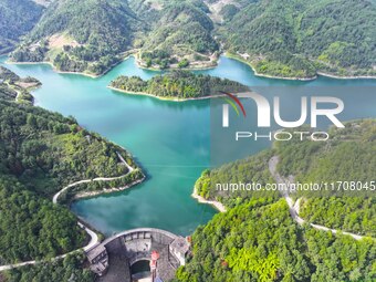 An aerial photo shows the scenery of Mingyue Lake in Chongqing, China, on October 25, 2024. (