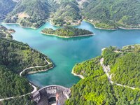 An aerial photo shows the scenery of Mingyue Lake in Chongqing, China, on October 25, 2024. (